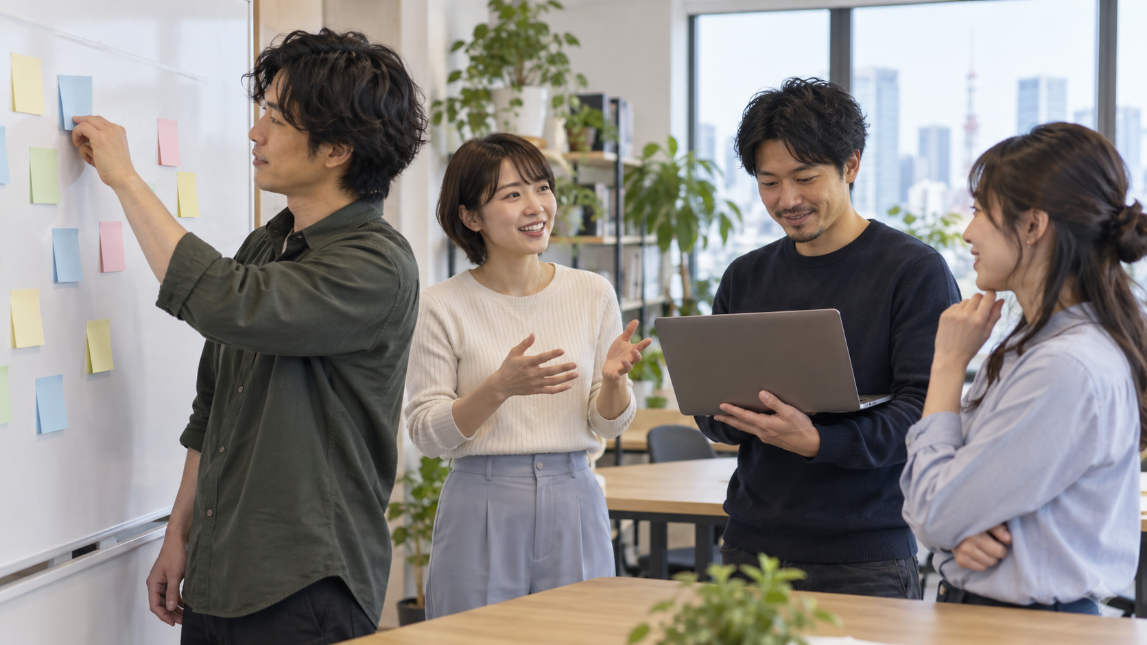 付箋のボードを確認しながら相談する四人の開発チームの生成画像